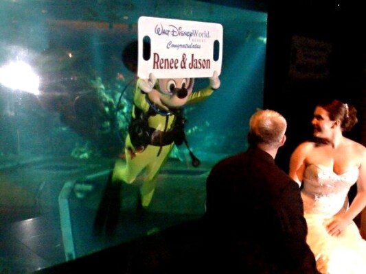 Underwater Magic - Mickey surprises the bride and groom at another successful Disney World Wedding Epcot Wedding
